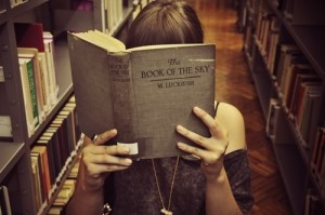 girl-reading-black-book (1)